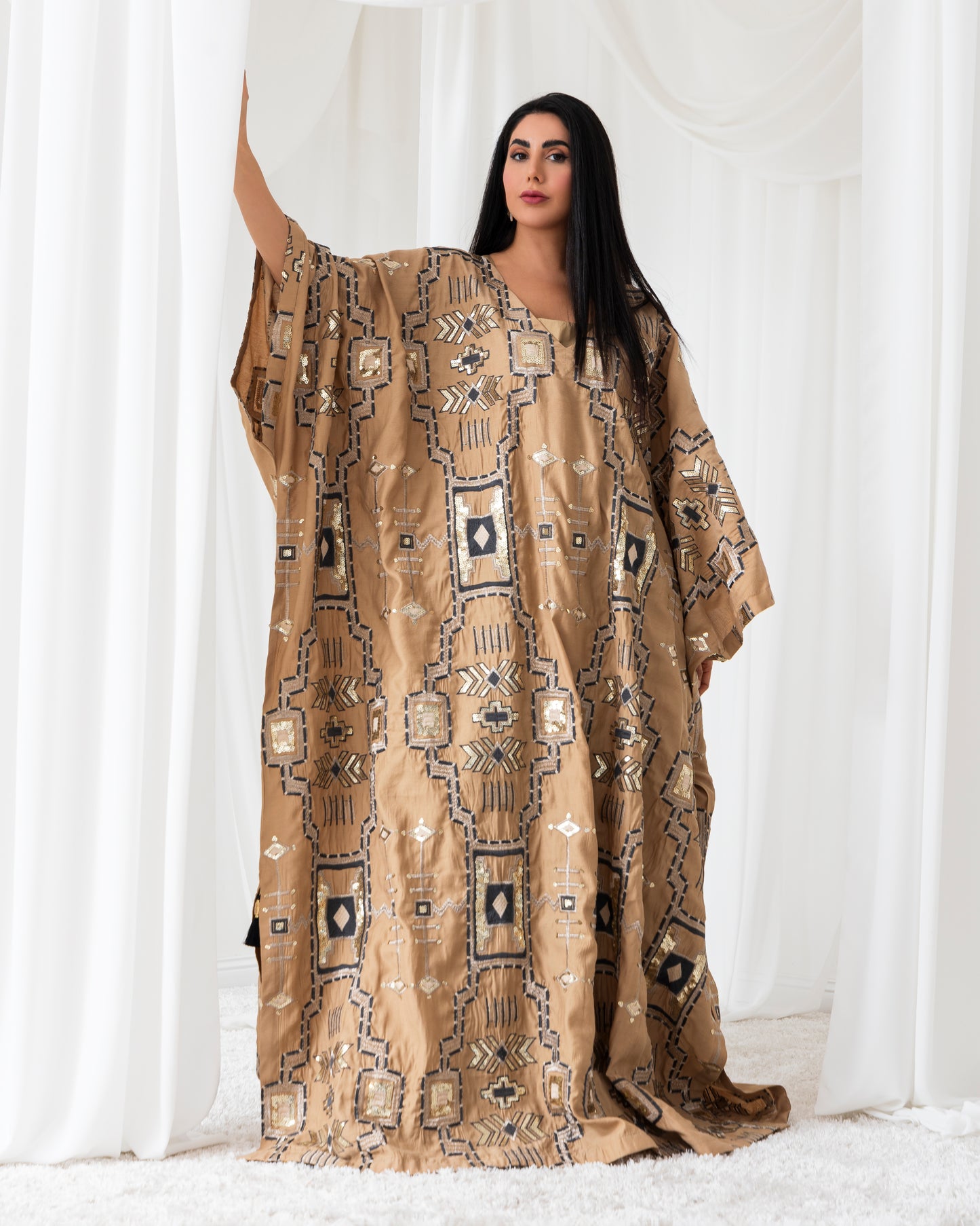 A radiant abaya that shines with confidence. Designed for the bold and beautiful