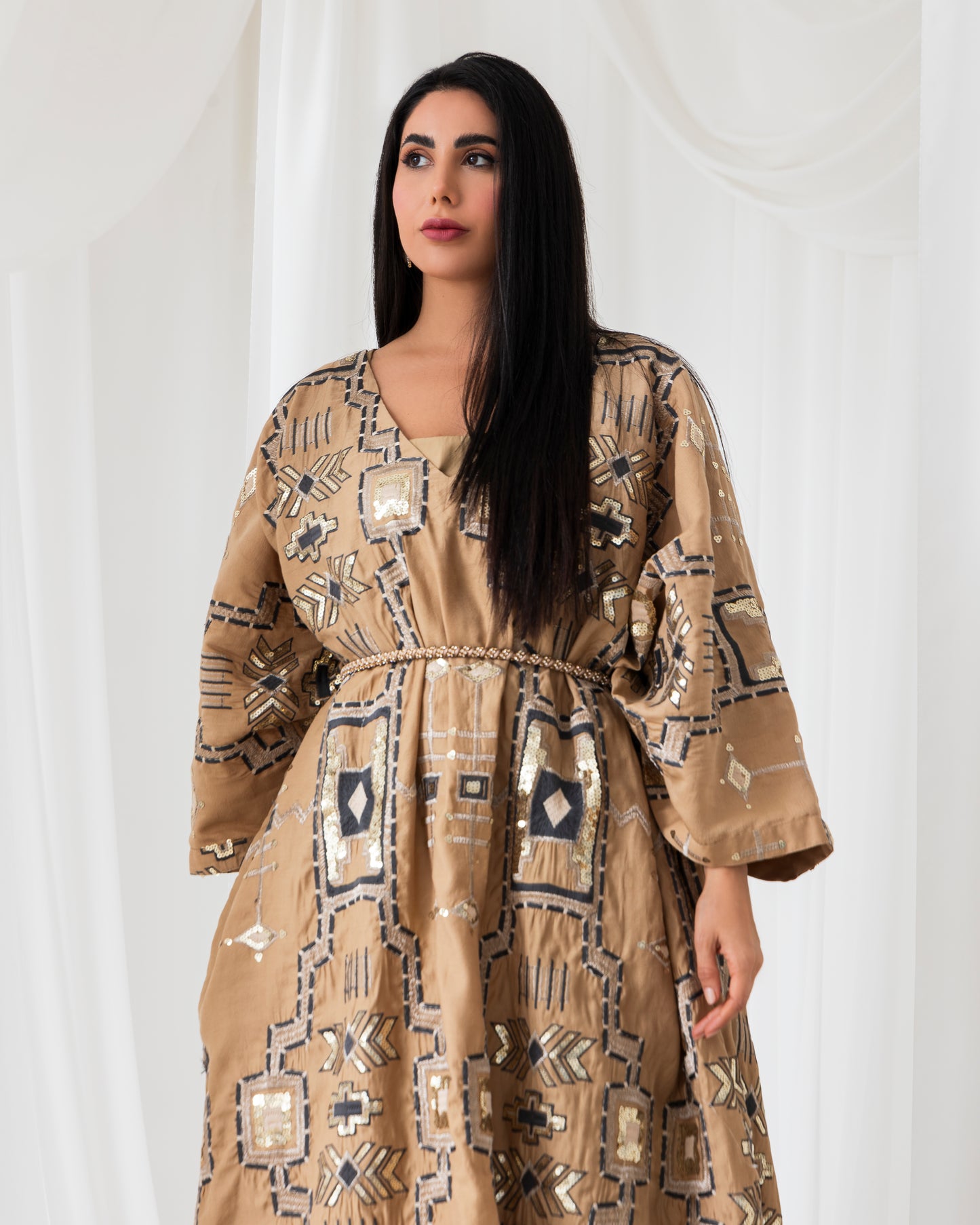 A radiant abaya that shines with confidence. Designed for the bold and beautiful