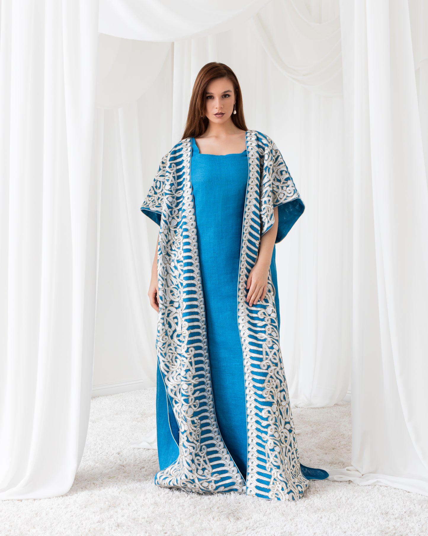 A heavenly abaya that radiates elegance and grace. Perfect for those who seek timeless beauty.