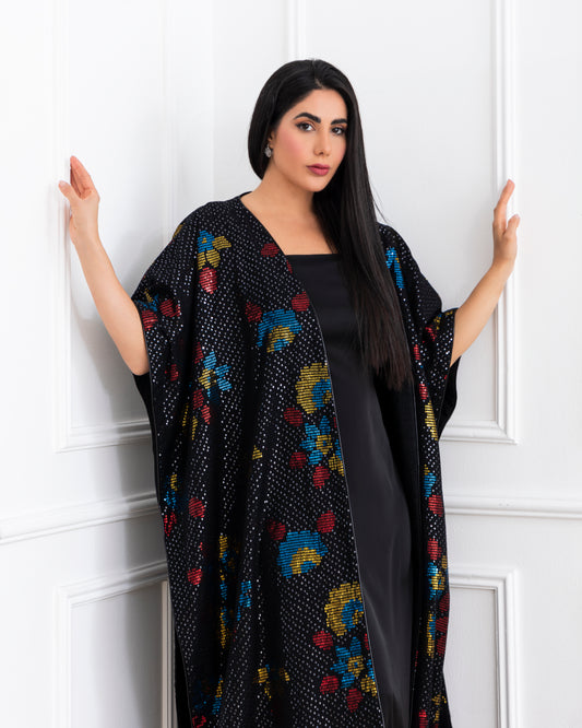 A luxurious abaya Ideal for special occasions and evening events.