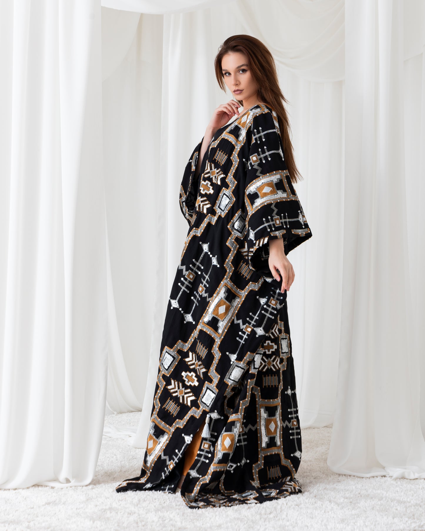 A radiant abaya that shines with confidence. Designed for the bold and beautiful