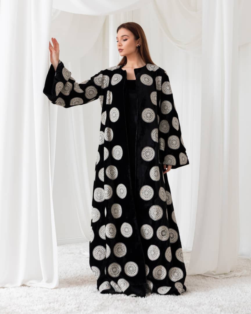 A worldly abaya that combines cultures and styles. Perfect for the modern, global woman