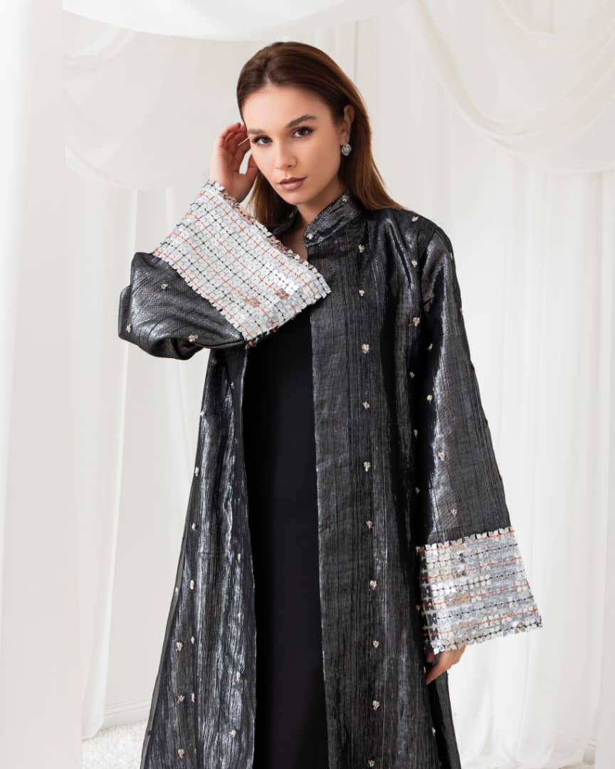 A moonlit abaya that glows in the night. Perfect for a magical evening look