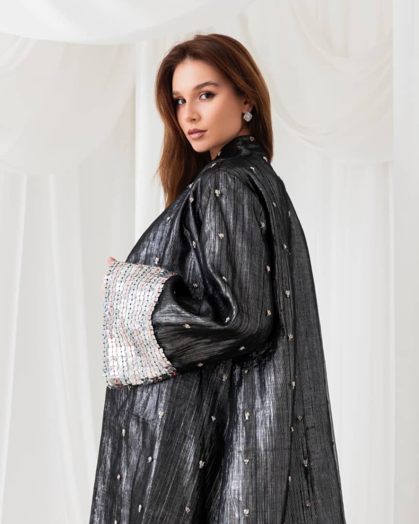 A moonlit abaya that glows in the night. Perfect for a magical evening look