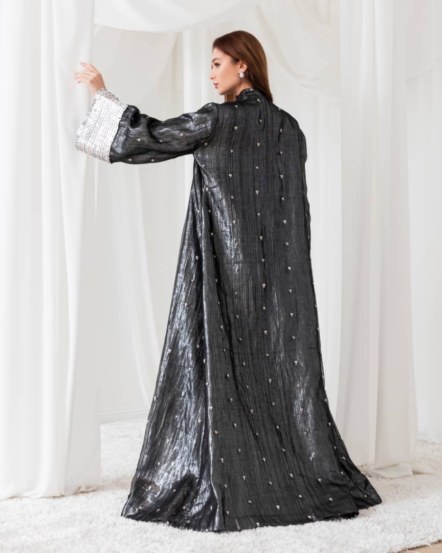 A moonlit abaya that glows in the night. Perfect for a magical evening look