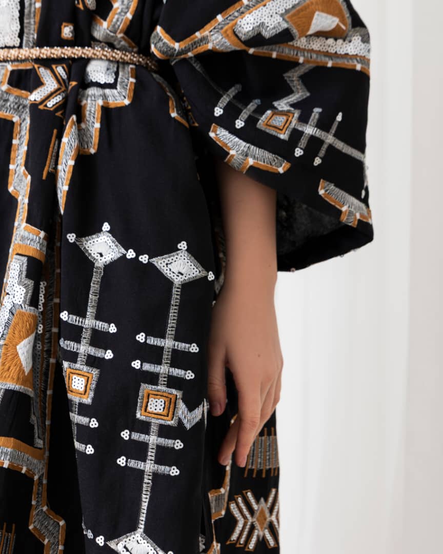 A radiant abaya that shines with confidence. Designed for the bold and beautiful